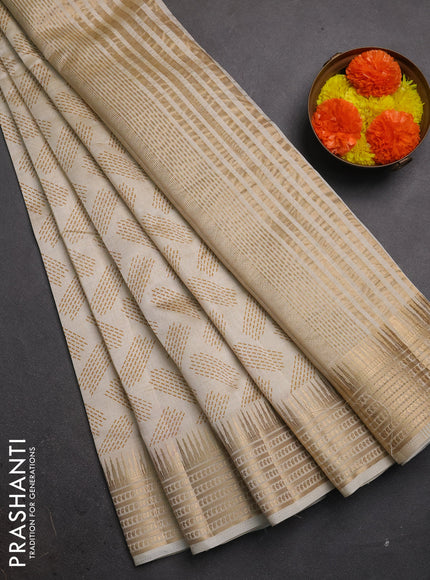 Semi raw silk saree cream with allover geometric butta prints and temple design zari woven border