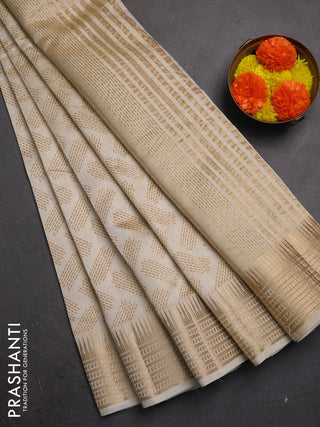 Semi raw silk saree cream with allover geometric butta prints and temple design zari woven border