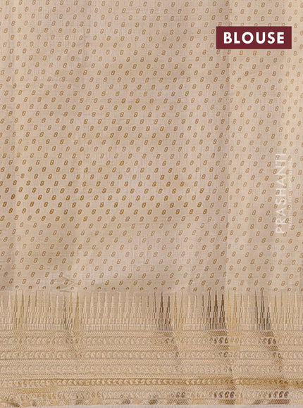 Semi raw silk saree cream with allover geometric butta prints and temple design zari woven border
