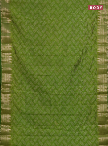 Semi raw silk saree light green with allover geometric butta prints and temple design zari woven border