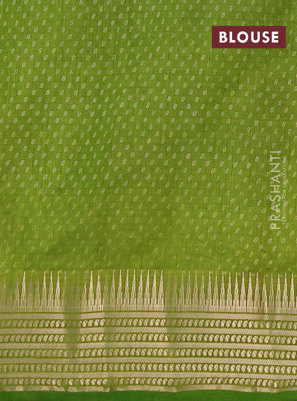 Semi raw silk saree light green with allover geometric butta prints and temple design zari woven border