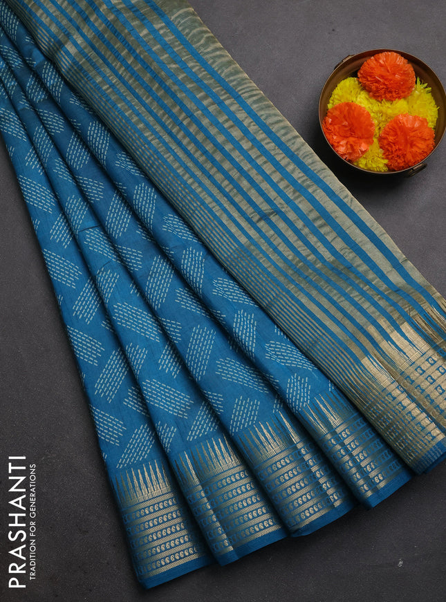Semi raw silk saree teal blue with allover geometric butta prints and temple design zari woven border