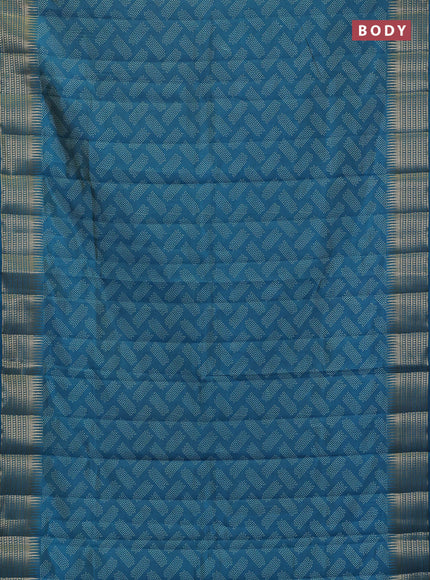 Semi raw silk saree teal blue with allover geometric butta prints and temple design zari woven border