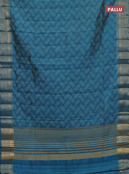 Semi raw silk saree teal blue with allover geometric butta prints and temple design zari woven border