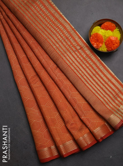 Semi raw silk saree rustic orange with allover geometric prints and zari woven border