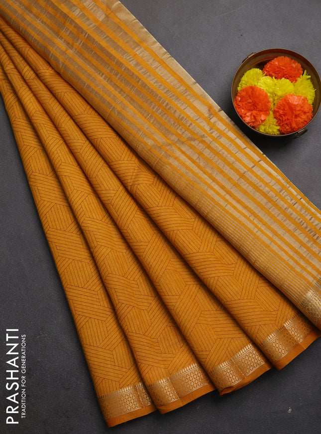 Semi raw silk saree dark mustard with allover geometric prints and zari woven border
