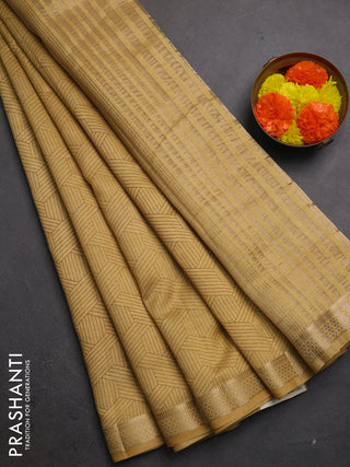 Semi raw silk saree beige with allover geometric prints and zari woven border
