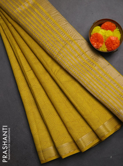 Semi raw silk saree lime yellow shade with allover geometric prints and zari woven border