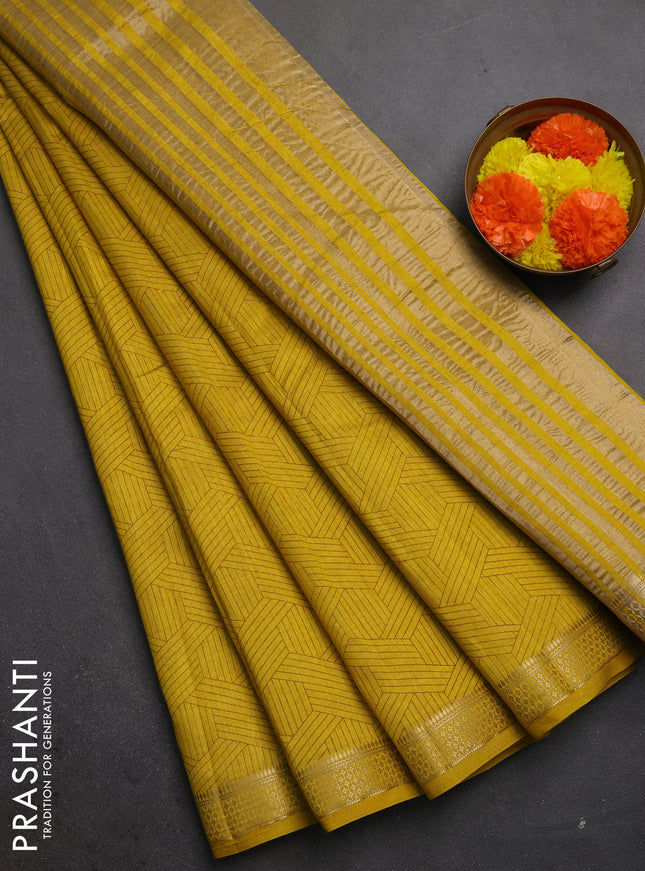 Semi raw silk saree lime yellow shade with allover geometric prints and zari woven border