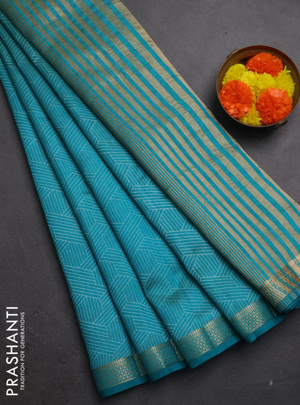Semi raw silk saree teal green with allover geometric prints and zari woven border