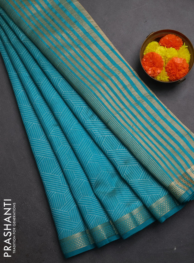 Semi raw silk saree teal green with allover geometric prints and zari woven border