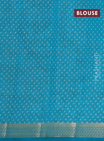 Semi raw silk saree teal green with allover geometric prints and zari woven border