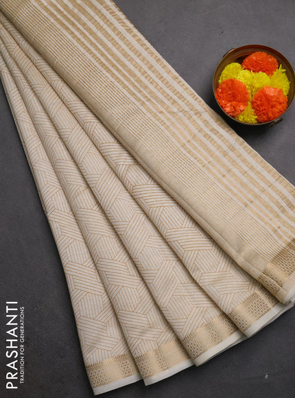 Semi raw silk saree cream with allover geometric prints and zari woven border