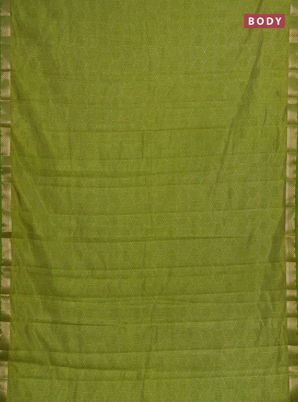 Semi raw silk saree light green with allover geometric prints and zari woven border