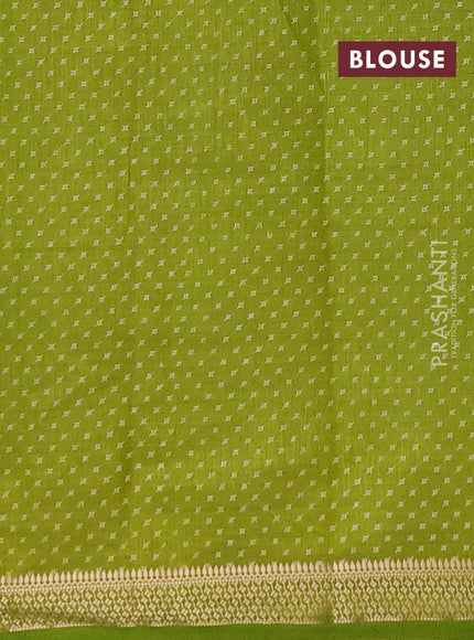 Semi raw silk saree light green with allover geometric prints and zari woven border