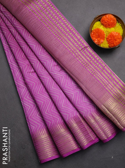 Semi raw silk saree lavender with allover zigzag prints and temple design zari woven border
