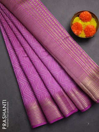 Semi raw silk saree lavender with allover zigzag prints and temple design zari woven border
