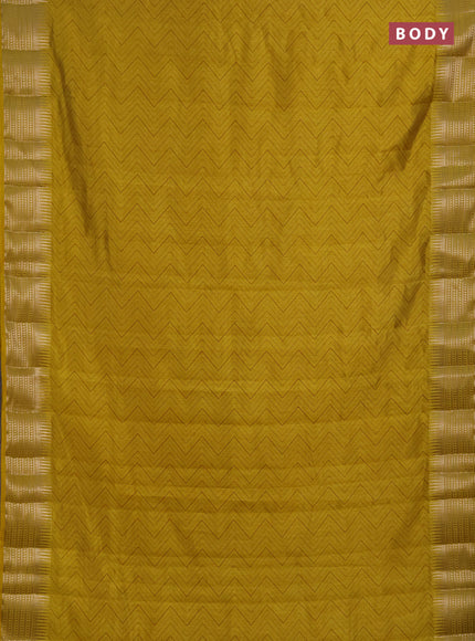 Semi raw silk saree mustard yellow with allover zigzag prints and temple design zari woven border