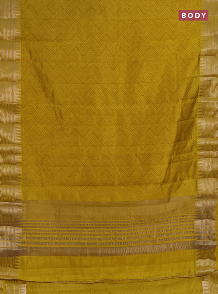 Semi raw silk saree mustard yellow with allover zigzag prints and temple design zari woven border