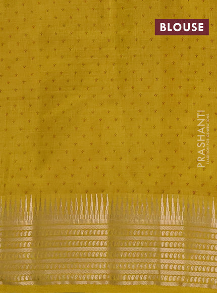 Semi raw silk saree mustard yellow with allover zigzag prints and temple design zari woven border
