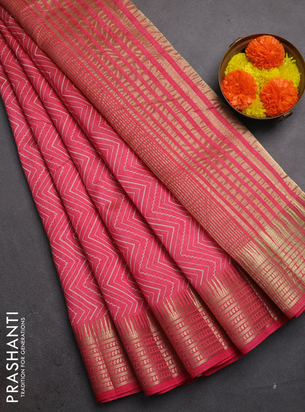 Semi raw silk saree pink shade with allover zigzag prints and temple design zari woven border