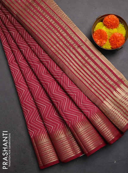 Semi raw silk saree maroon with allover zigzag prints and temple design zari woven border