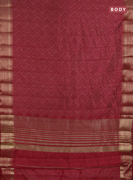 Semi raw silk saree maroon with allover zigzag prints and temple design zari woven border