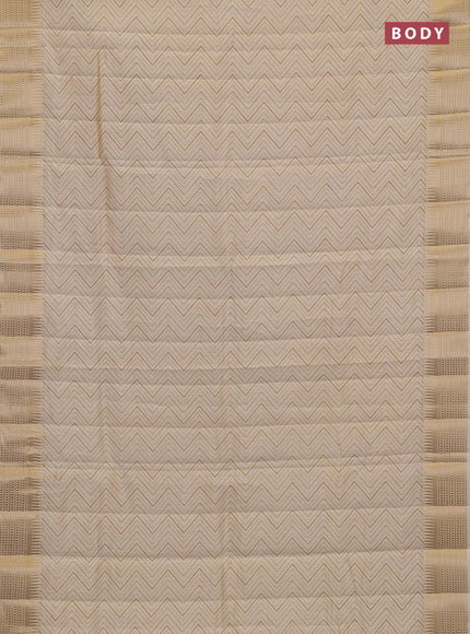 Semi raw silk saree cream with allover zigzag prints and temple design zari woven border