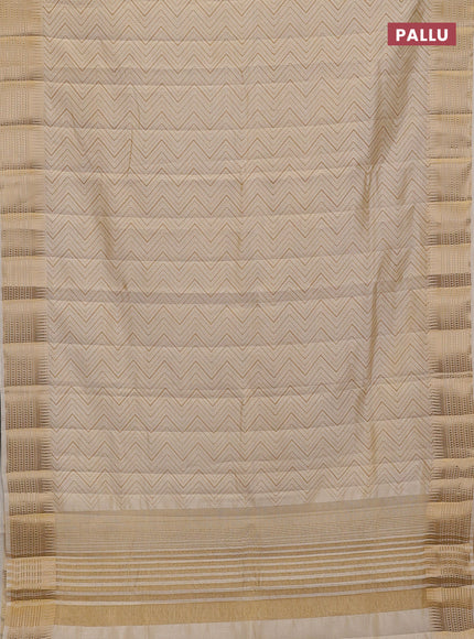 Semi raw silk saree cream with allover zigzag prints and temple design zari woven border