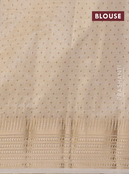 Semi raw silk saree cream with allover zigzag prints and temple design zari woven border