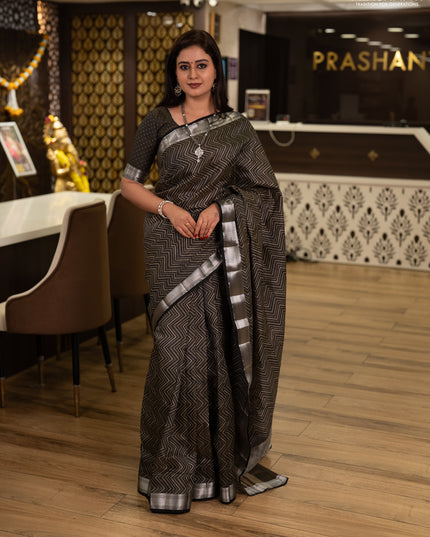 Semi raw silk saree olive green with allover zigzag prints and temple design zari woven border
