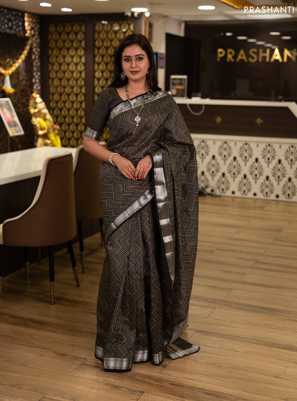 Semi raw silk saree olive green with allover zigzag prints and temple design zari woven border