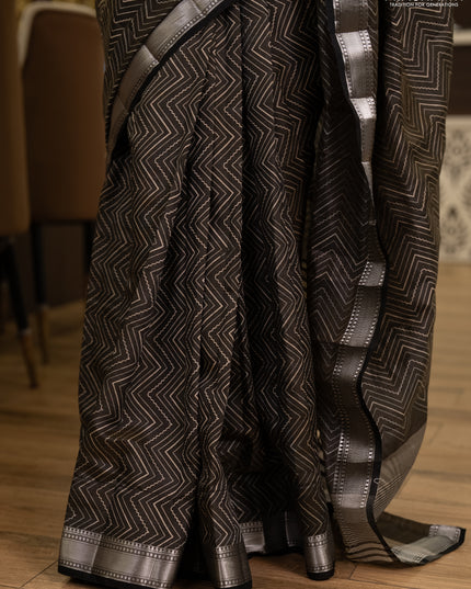Semi raw silk saree olive green with allover zigzag prints and temple design zari woven border