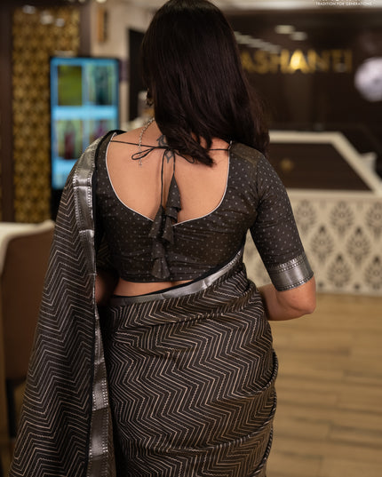Semi raw silk saree olive green with allover zigzag prints and temple design zari woven border