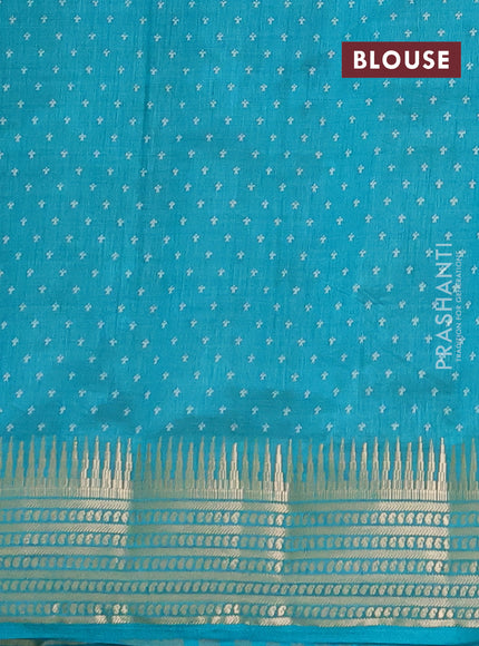 Semi raw silk saree teal green with allover zigzag prints and temple design zari woven border