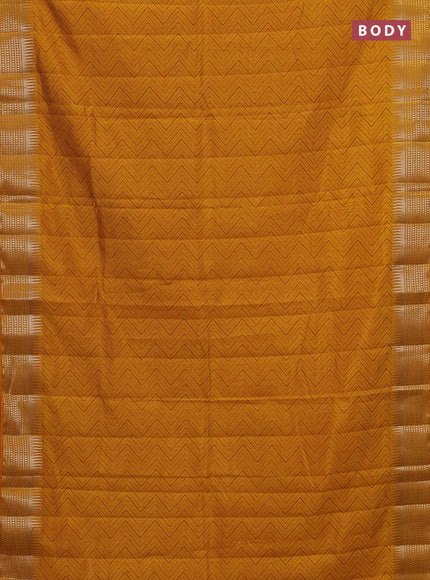 Semi raw silk saree dark mustard with allover zigzag prints and temple design zari woven border