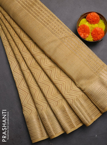 Semi raw silk saree sandal with allover zigzag prints and temple design zari woven border