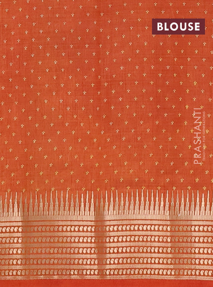 Semi raw silk saree rustic orange with allover zigzag prints and temple design zari woven border