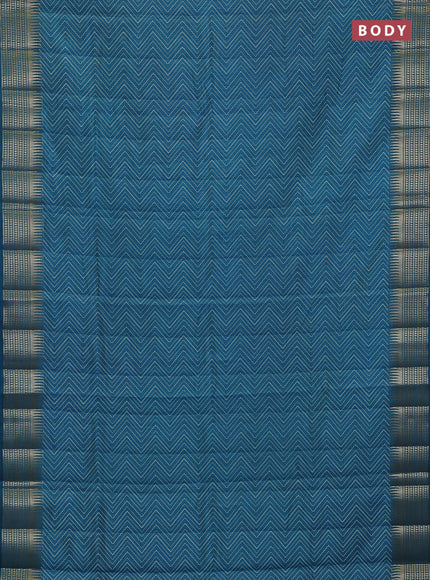 Semi raw silk saree teal blue with allover zigzag prints and temple design zari woven border
