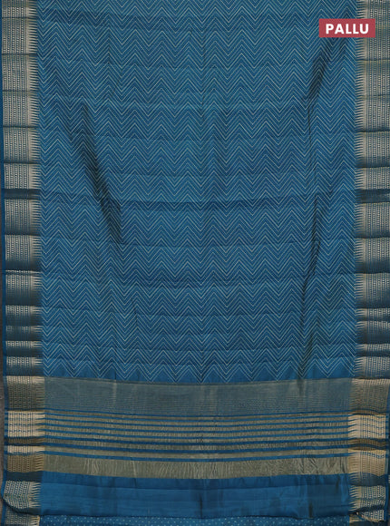 Semi raw silk saree teal blue with allover zigzag prints and temple design zari woven border
