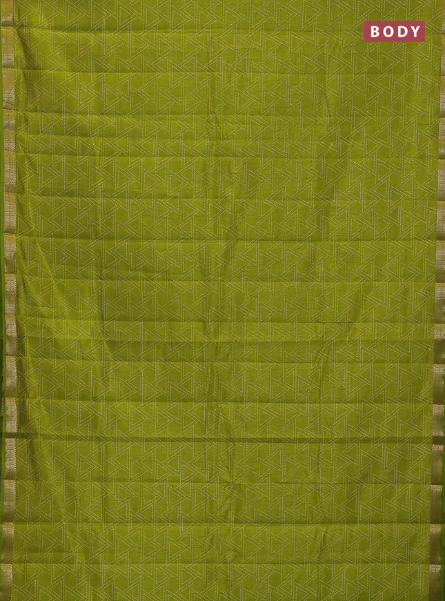 Semi raw silk saree light green with allover geometric prints and zari woven border