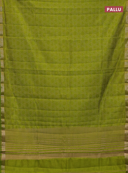 Semi raw silk saree light green with allover geometric prints and zari woven border