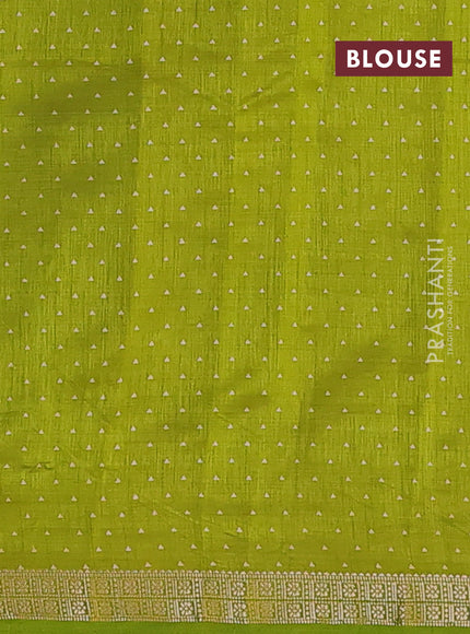Semi raw silk saree light green with allover geometric prints and zari woven border