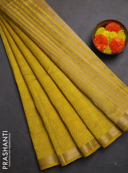 Semi raw silk saree mustard yellow with allover geometric prints and zari woven border