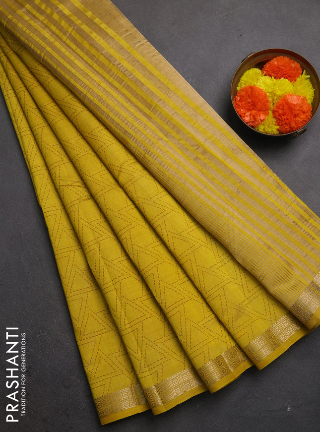 Semi raw silk saree mustard yellow with allover geometric prints and zari woven border