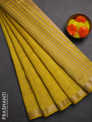 Semi raw silk saree mustard yellow with allover geometric prints and zari woven border