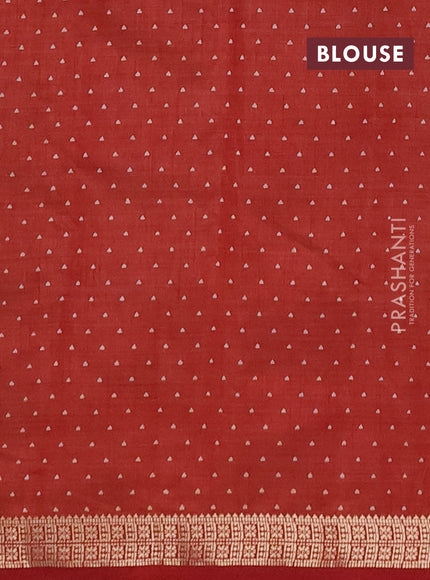 Semi raw silk saree rust shade with allover geometric prints and zari woven border