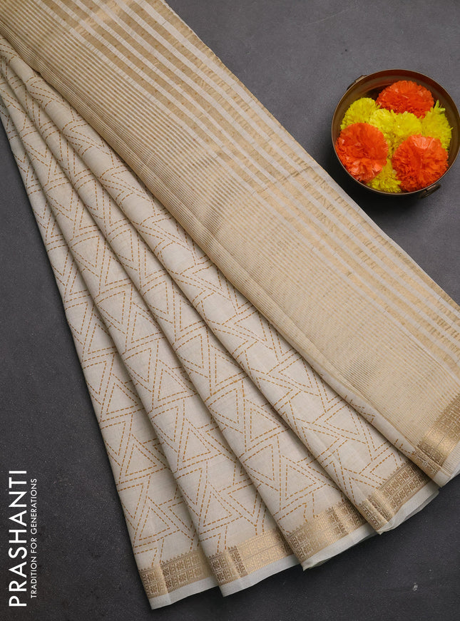Semi raw silk saree cream with allover geometric prints and zari woven border