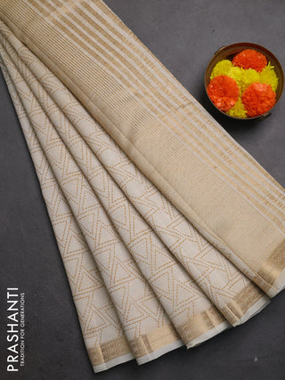 Semi raw silk saree cream with allover geometric prints and zari woven border