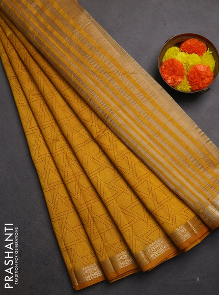 Semi raw silk saree dark mustard with allover geometric prints and zari woven border
